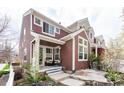 Attractive two-story home with a cozy front porch and well-maintained exterior at 661 Snowberry St, Longmont, CO 80503