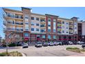 Attractive exterior of a mixed use building with street parking available in front at 10111 Inverness Main St # 230, Englewood, CO 80112