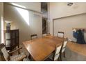 Cozy dining room with tall ceilings, lots of natural light, and room to entertain at 4614 Lyndenwood Cir, Highlands Ranch, CO 80130