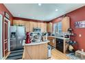 Kitchen with stainless steel appliances and an island at 1752 E 164Th Pl, Brighton, CO 80602