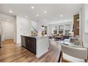 Modern kitchen with stainless steel appliances and an open-concept design at 17848 Gallup St, Broomfield, CO 80023