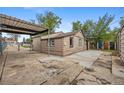 Ample parking space in the home's backyard with covered area and room for RV at 530 S Quitman St, Denver, CO 80219
