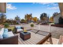 Relaxing back patio with seating area, offering a peaceful outdoor space at 3995 Independence Ct, Wheat Ridge, CO 80033