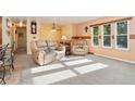 Comfortable seating area with large windows offering natural light at 5870 Quail St, Arvada, CO 80004