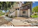 Exterior of a condo with stairs leading to the entrance, and a balcony at 4903 W 73Rd Ave, Westminster, CO 80030