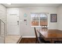 Charming dining area features modern lighting, a window, and stylish decor at 1060 S Parker Rd # 19, Denver, CO 80231