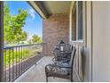 Cozy balcony featuring a charming seating area, perfect for enjoying outdoor views and relaxation at 504 E Dry Creek Pl, Littleton, CO 80122