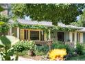 Inviting single-story home with lovely curb appeal and a well-maintained garden at 1315 Tipperary St, Boulder, CO 80303