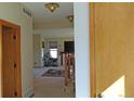 Inviting living room featuring a neutral color palette and staircase at 7490 W Coal Mine Ave # A, Littleton, CO 80123