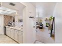 A cozy living room space includes hardwood floors and a gray couch at 23694 Pondview Pl # B, Golden, CO 80401