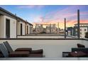 City skyline view from the rooftop deck, perfect for relaxation and entertainment at 1836 Grove St # 105, Denver, CO 80204