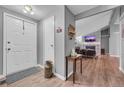 Bright and spacious entryway with wood floors and access to living room at 2017 Tulane St, Denver, CO 80260