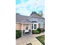 A cozy townhome with a well-kept front yard and inviting entrance at 1748 Eagle St # B, Aurora, CO 80011