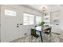 Charming dining area with a table and chairs near the entrance at 172 S Lowell Blvd, Denver, CO 80219