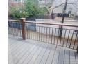 View of a fenced-in deck, with a wood floor at 805 E 7Th Ave # 8, Denver, CO 80218
