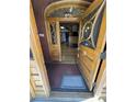 Grand foyer with stunning wood detailing and hardwood floors creates a memorable entrance at 1625 N Downing St, Denver, CO 80218