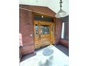 Elegant front door with decorative glass insert offers a glimpse of the home's character at 1625 N Downing St, Denver, CO 80218
