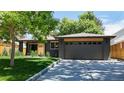 Stylish single-story home with a two-car garage and concrete driveway at 1830 S Fillmore St, Denver, CO 80210