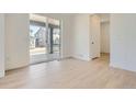 Bright room with sliding glass doors leading to an outdoor patio at 2154 S Gold Bug Way, Aurora, CO 80018