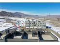 New townhomes under construction, featuring mountain views and individual patios at 14422 Pansy Loop, Morrison, CO 80465