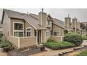 Inviting exterior featuring a well-maintained facade, cozy porch, and manicured front yard with healthy shrubs at 6839 Zenobia St # 3, Westminster, CO 80030