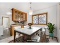 Kitchen dining area with a table and chairs at 4881 S Washington St, Englewood, CO 80113