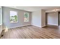 Spacious living room boasts ample natural light, creating a warm and inviting atmosphere at 3420 N Steele St, Denver, CO 80205