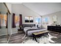 Spacious bedroom with a king-size bed, large windows, and a walk-in closet at 3738 Rosewalk Ct, Highlands Ranch, CO 80129