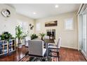 Contemporary dining area boasting modern lighting and a stylish accent rug at 3379 Cranston Cir, Littleton, CO 80126