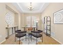 Dedicated office space with neutral tones and plenty of room to work at 9581 Firenze Way, Highlands Ranch, CO 80126