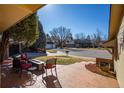 Comfortable outdoor patio setting with seating area offering neighborhood view and space for relaxation and entertaining at 4967 E Lake Ave, Centennial, CO 80121