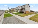 Exterior view of a home situated on a tree-lined street at 14075 Scarlet Sage St, Parker, CO 80134