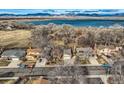 Desirable neighborhood with mountain views and a lake, showcasing the serene setting and community feel at 8965 Jellison Ct, Broomfield, CO 80021