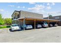 Carport with multiple covered parking spaces, providing convenient and protected vehicle storage at 11402 W 17Th Pl, Lakewood, CO 80215
