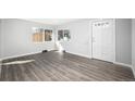 Bright living room showcasing sleek flooring and a fresh, modern look at 832 Dahlia St, Denver, CO 80220