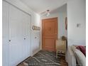Inviting entryway with a unique front door, closet, and stylish decor at 1050 N Lafayette St # 408, Denver, CO 80218