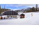 Ski lift with snowy mountain views and winter activities at 645 S Park Ave # 302, Breckenridge, CO 80424