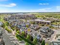 Stunning aerial view of the residential community with green spaces and mountain views at 85 Uinta Way # 603, Denver, CO 80230