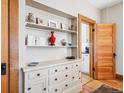 Stylish built-in shelving with display space and storage, adding character to the home at 3051 W 39Th Ave, Denver, CO 80211
