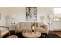 Cozy living room with a comfortable sofa, decorative pillows, and a stylish coffee table at 4420 W 27Th Ave, Denver, CO 80212