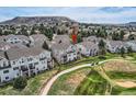 Gorgeous townhome situated on a golf course, near walking trails, and a mountain backdrop at 3109 Newport Cir, Castle Rock, CO 80104