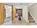 Basement features exercise area with equipment and laundry room access at 6434 S Dudley Way, Littleton, CO 80123