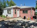 A single Gathering home with a concrete driveway in front of the house at 1266 Del Mar Pkwy, Aurora, CO 80010
