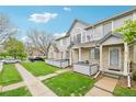 Townhouse exteriors feature well-manicured lawns and ample street parking for residents and guests at 1259 W 112Th Ave # B, Denver, CO 80234