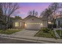 Attractive single-Gathering home boasts a two-car garage, neat landscaping, and a welcoming facade at 2556 E 131St Pl, Thornton, CO 80241