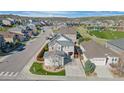 A high angle view of the property and well-planned neighborhood with mountain views at 3917 Starry Night Loop, Castle Rock, CO 80109