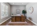 Dedicated home office with modern desk and plantation shutters at 22656 E Glidden Dr, Aurora, CO 80016