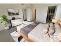 Spacious main bedroom with walk-in closet and neutral decor at 5512 Danube St, Denver, CO 80249