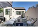 Inviting rooftop patio featuring comfortable seating, a fire pit, and a relaxing space for outdoor living and entertaining at 2434 Mapleton Ave, Boulder, CO 80304