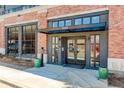 Attractive building entrance with brick facade and modern architectural details at 3500 S Corona St # 205, Englewood, CO 80113